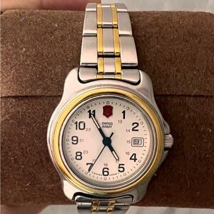 Swiss Army Victorinox women’s White Dial Gold and Stainless Steel Watch